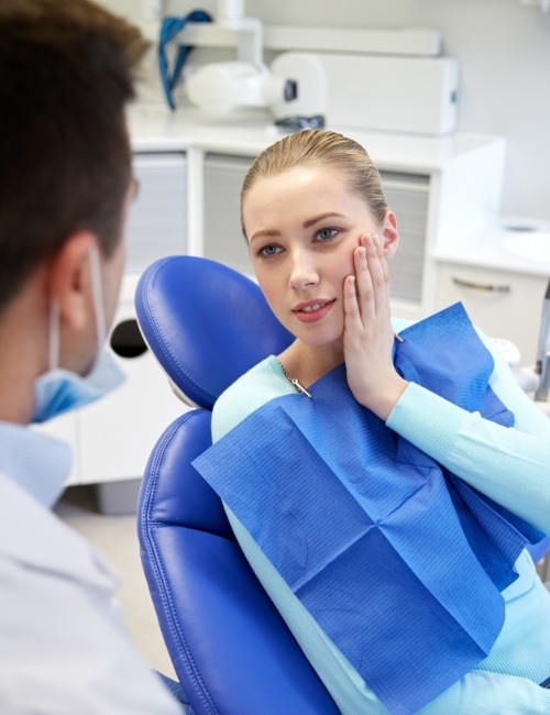 Woman in pain before emergency dentistry treatment